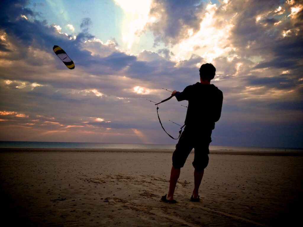 kite flying at st ouen's bay, in jersey.